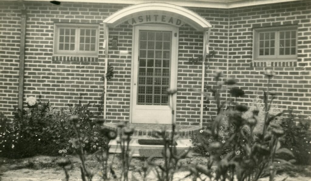 A close up of the front door of the Dixon house at 516 Ward Street. "Ashtead" derives from Old English, and means "homestead among the ash trees." It's often used in place of "homestead" or simply, "place." Photographed in 1936. (Florida Archives)